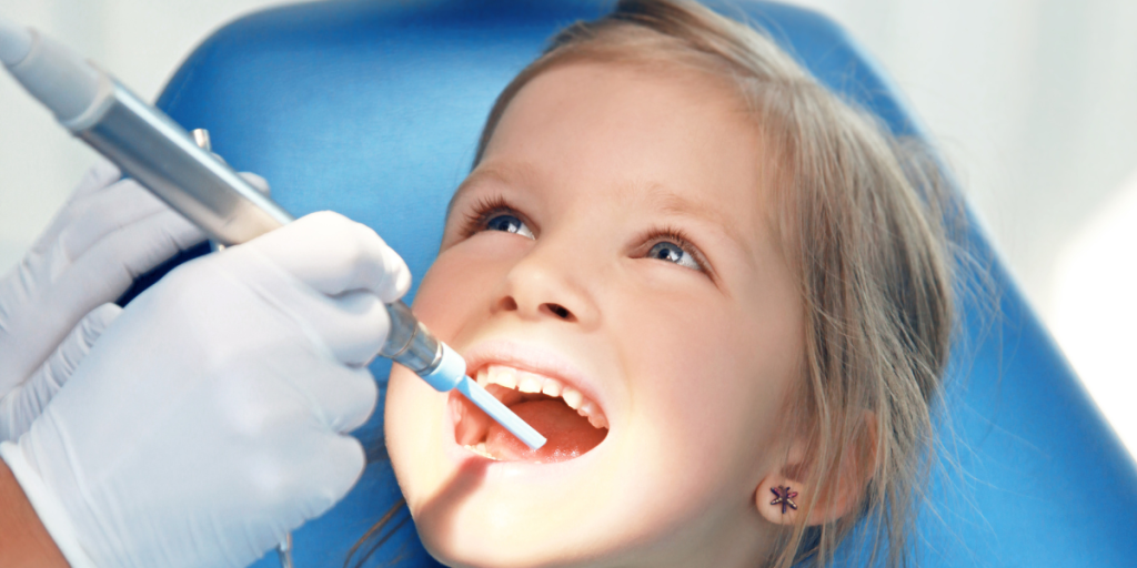 kids dentist in Oakville applying dental sealants at Kids Corner Medical & Dental