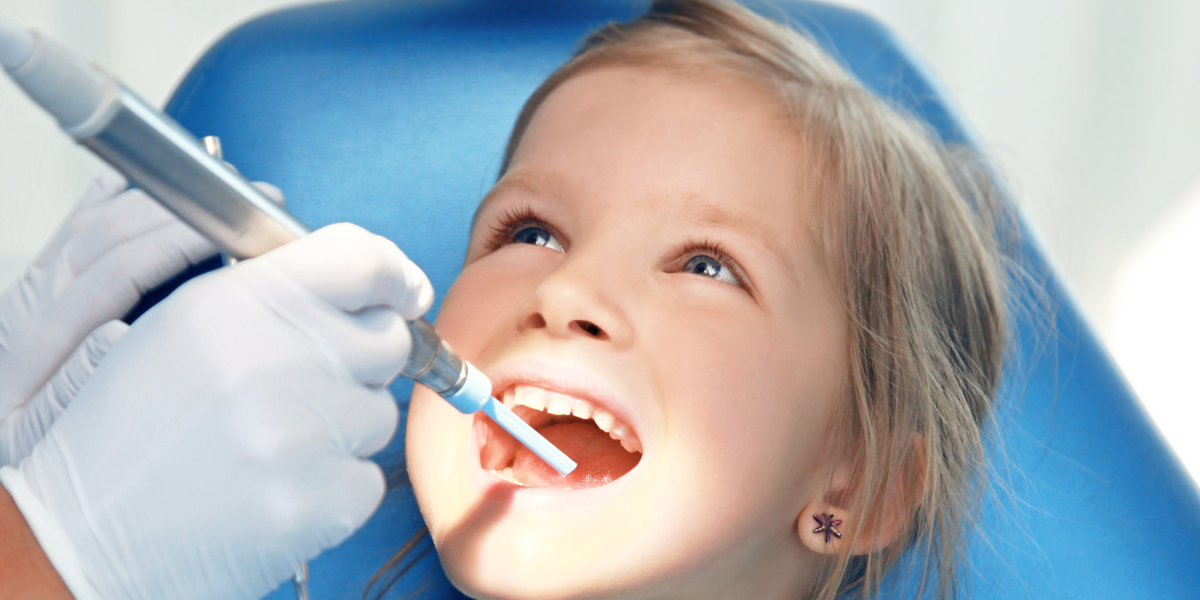 kids dentist in Oakville applying dental sealants at Kids Corner Medical & Dental